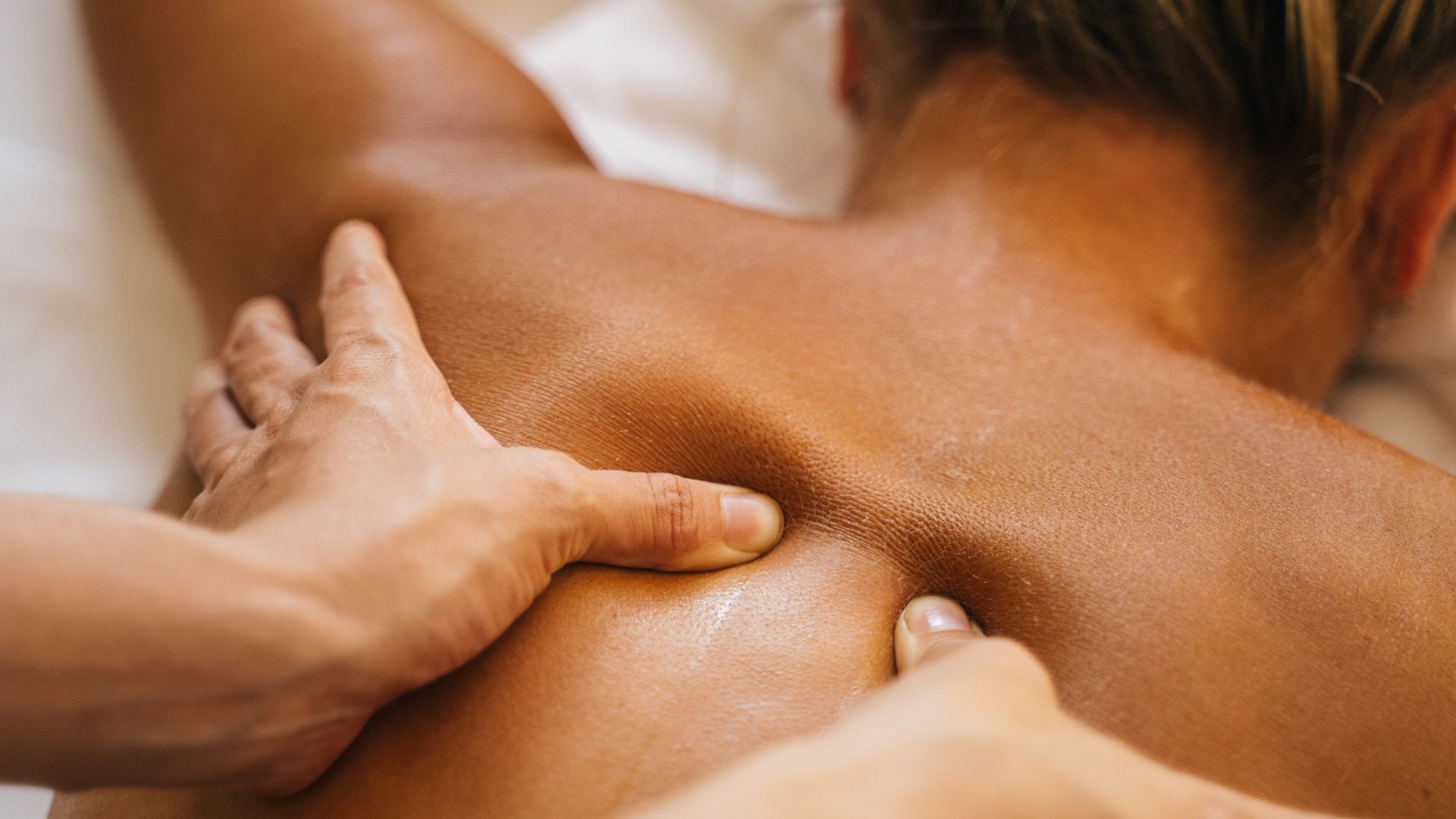 person getting deep tissue massage
