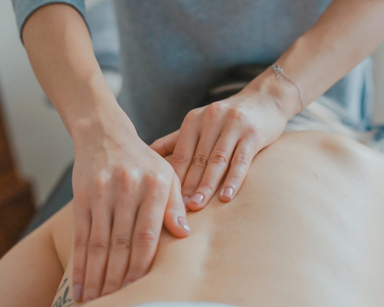 person receiving lymphatic drainage services
