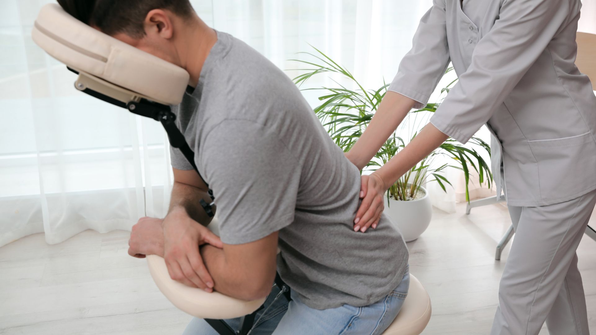 man receiving chair massage