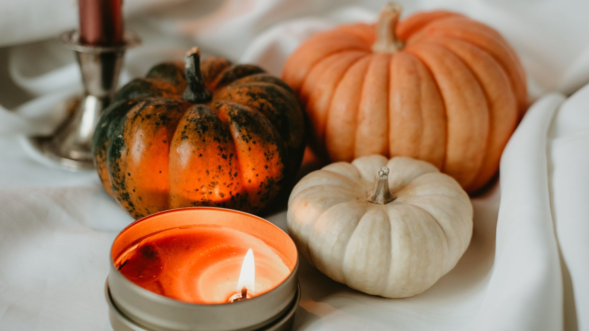 pumpkins and candle